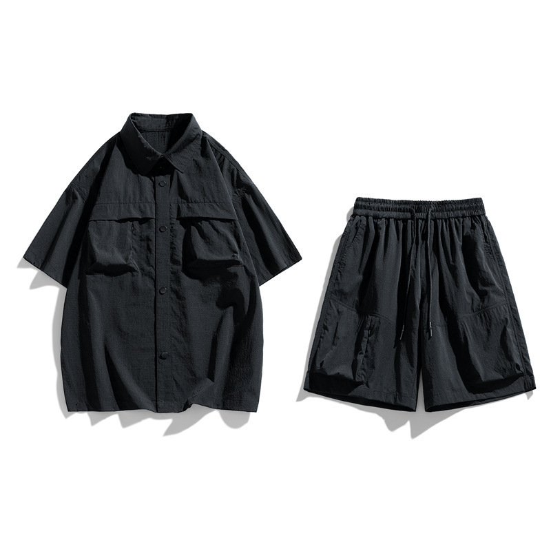 Trajes deportivos de moda masculinos de moda dos pantalones cortos de mangas cortas de verano sueltos y frescos al por mayor