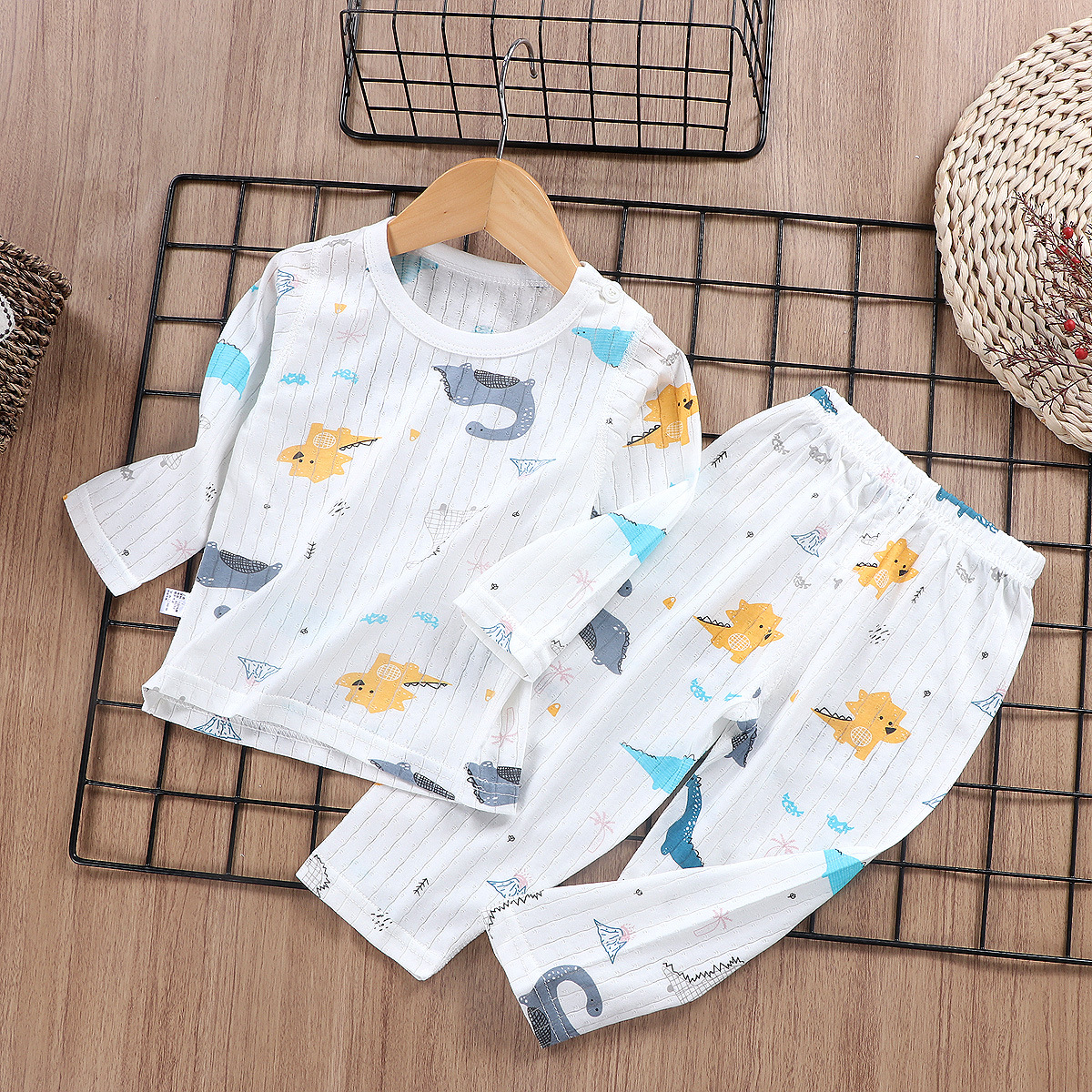 Ropa de hogar para niños ropa de hogar para bebés delgada sin hueso de algodón conjunto de pijamas al por mayor personalizado pro-piel manga corta