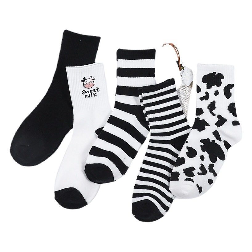 Four Seasons Nuevo tubo de tubo medio, vacas con manchas, calcetines de moda ins, absorbentes de sudor, lindos calcetines de mujer a rayas de color sólido japonés, al por mayor