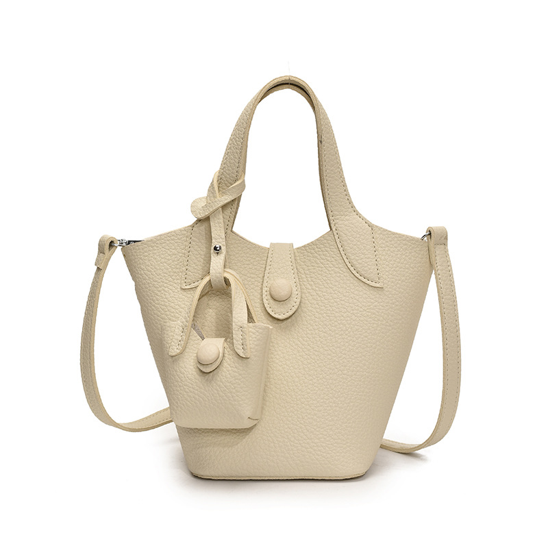 Tendencia de comercio exterior, bolsa de cubo de mano de nicho para mujer 2025 nuevo bolso de hombro casual de todo fósforo bolso de mensajero de moda de estilo occidental