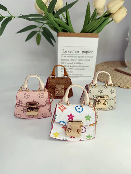 2026 Spring Trendy Mini Handbag Pendant Keychain Small Fan-Shaped Bag with a Stylish Design and Lock Clasp