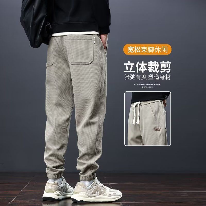 Pantalones de hombre transfronterizos de otoño y invierno, pantalones deportivos sueltos con cordón, pantalones cálidos y casuales más gruesos