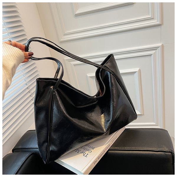 Handheld shoulder bag