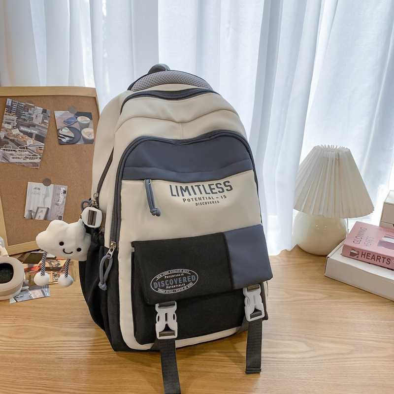 Mochilas escolares de alto valor facial nuevas estudiantes de primavera 2025 moda ligera y viajes al aire libre de gran capacidad con bolsos de hombro