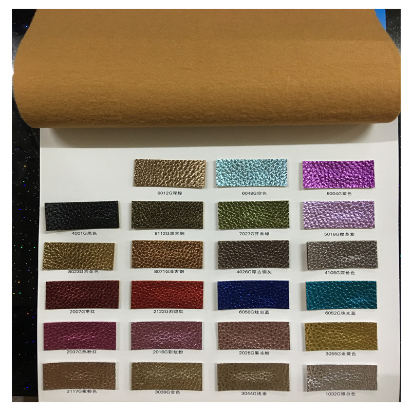 现货批发经典贴膜PU荔枝纹皮革面料手袋箱包沙发装饰软包餐椅包装