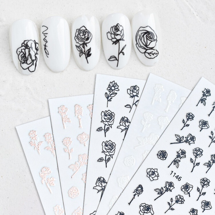 Hand-painted rose flower nail stickers mixed batch black and white flower 3d adhesive solid color bronzing hollow nail decals wholesale Hand-painted rose flower nail stickers mixed batch black and white flower 3d adhesive solid color bronzing hollow nail decals wholesale