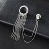 Golden brooch with tassels, trend silver suit, chain, pin