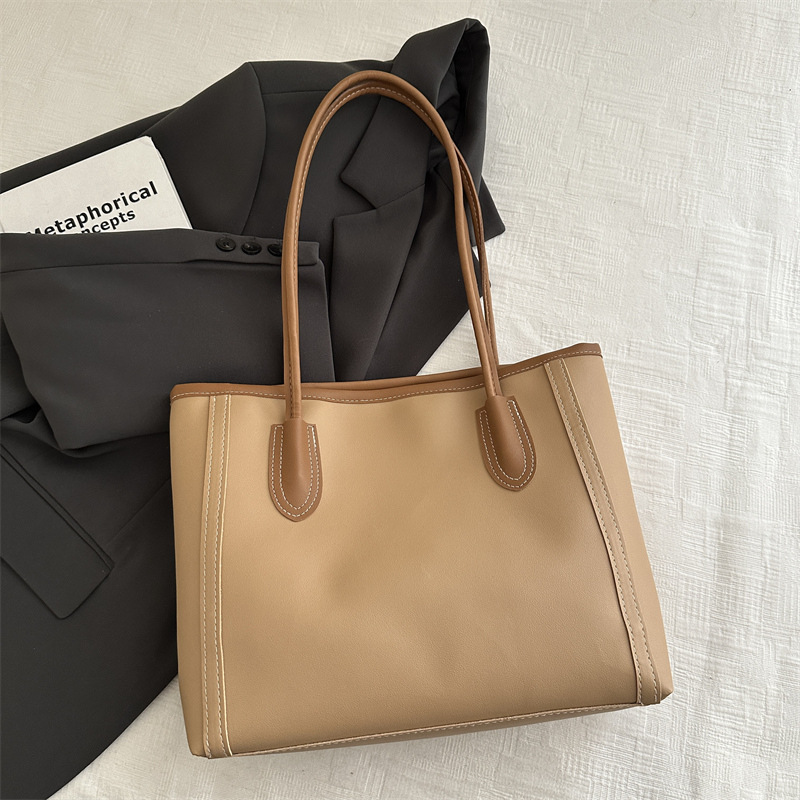 Bolsa axillar de gran capacidad para mujeres 2024 nueva moda otoño invierno sensación de bolso de hombro para estudiantes casuales bolso de clase