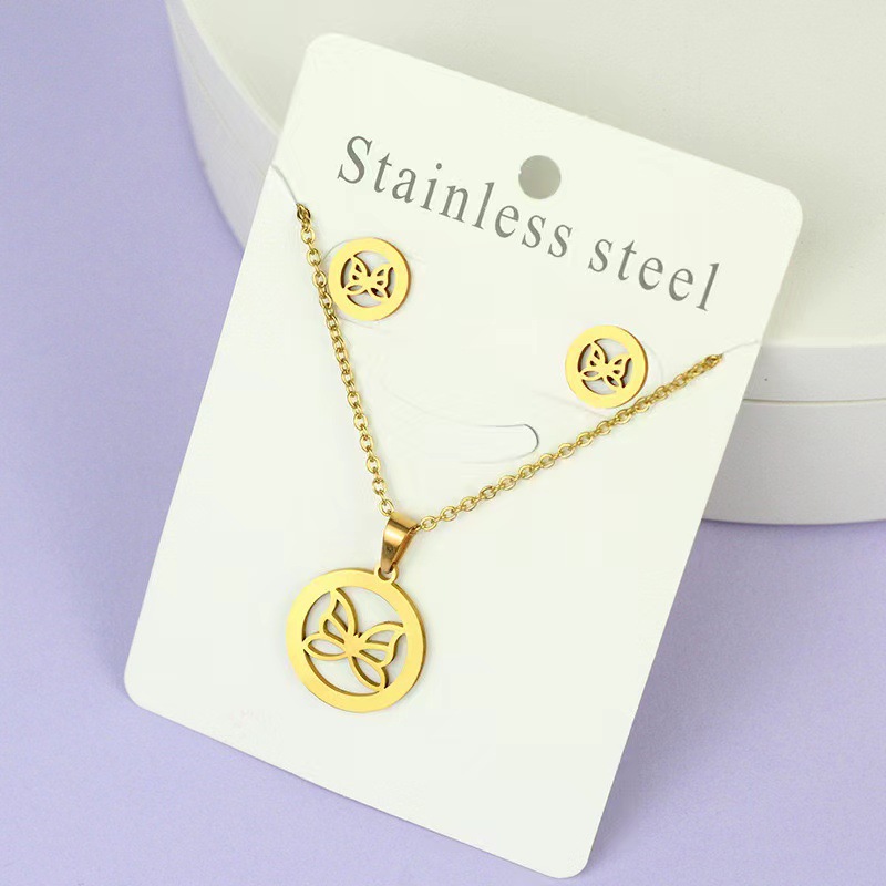 Net Red Butterfly Love Cross Personalidad Simple Juego de joyas de acero inoxidable Pendientes de oro Juego de collar al por mayor