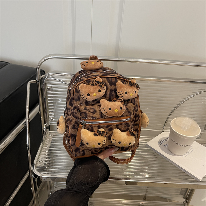 Nicho Hot Girl nueva mochila de dibujos animados con patrón de leopardo para almacenar mochila de peluche de viaje al aire libre