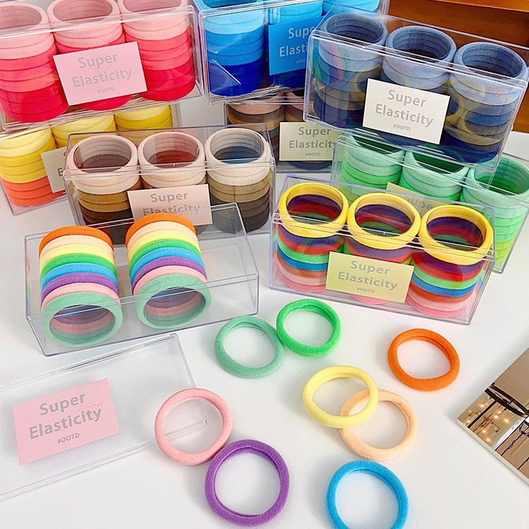 Accesorios para el cabello banda para el cabello al por mayor en caja de alta elástica negro banda de goma sin costura lazo del pelo cuerda de pelo durable cuerda de pelo de cola de caballo