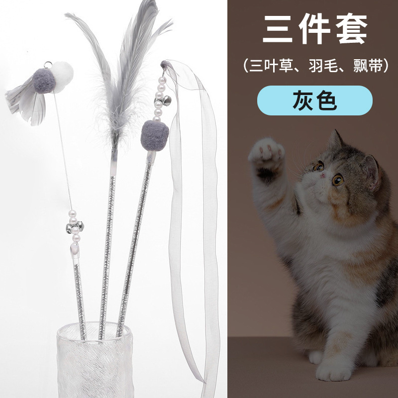 国境を越えた新しい猫のおもちゃ、猫の面白いスティック、妖精のスティック、自己刺激ベル、羽の長いポール、噛みつきにくいペット用品卸売