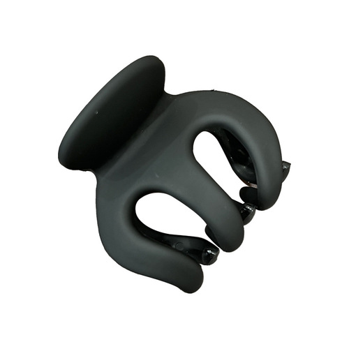 Pumpkin-shaped claw clips securing a high ponytail with small hair clips, fixed in a bun hairstyle, hair pin head accessory