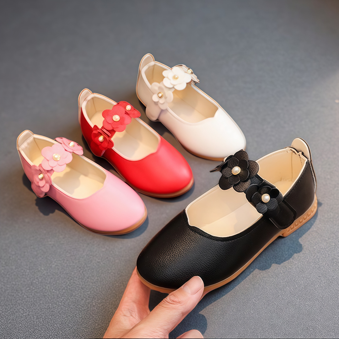 Children's white shoes made of black leather for students