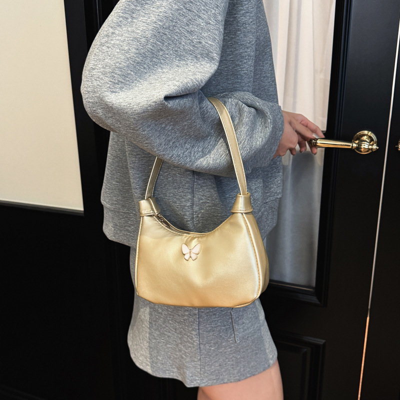 Coreana simple color sólido bolso de hombro para niños y niñas, pequeño y exquisito bolso de mano para bebés mariposa 2026 nuevo bolso para niños