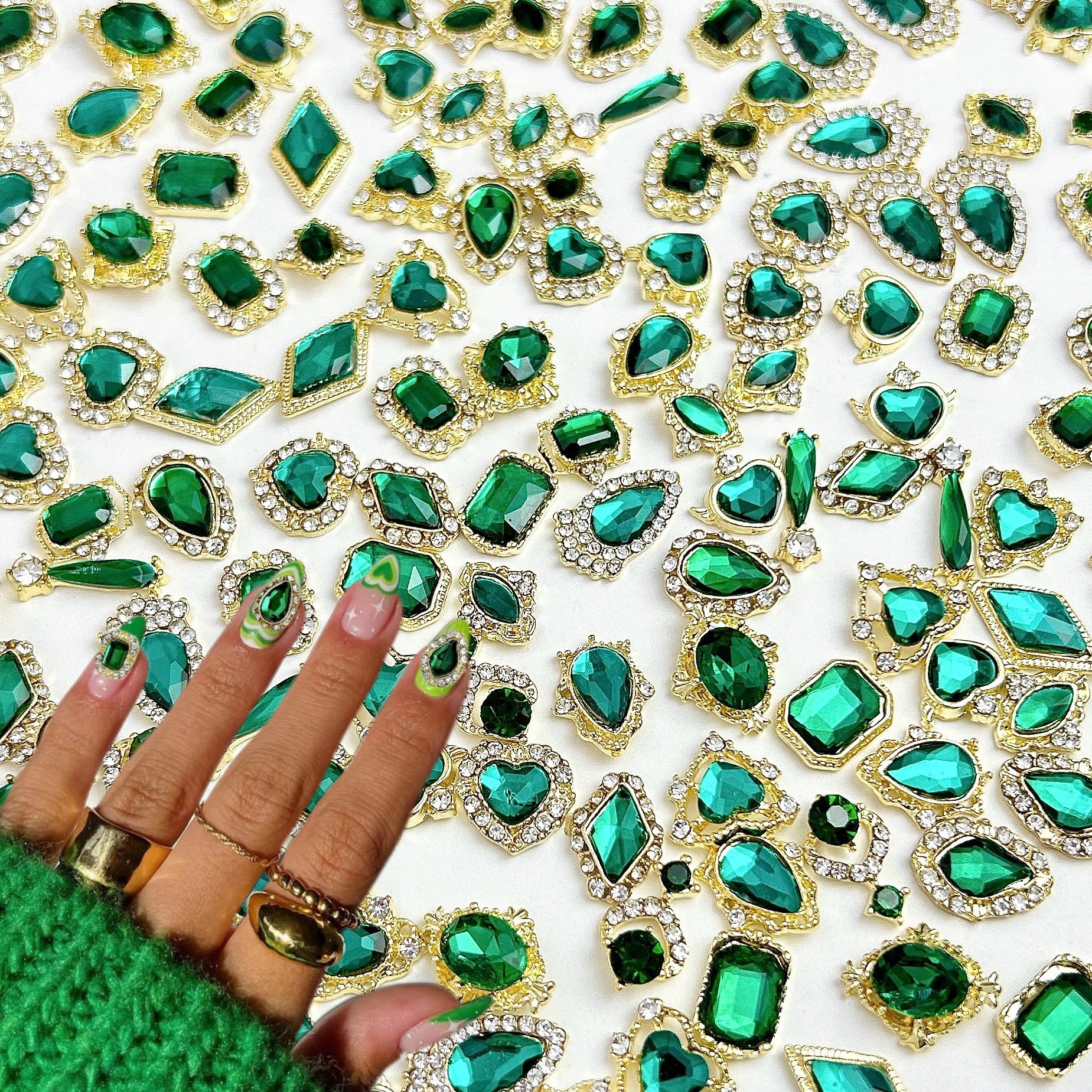 Nueva aleación china joyas de manicura taladro explosión grasa flash Fang amor gota de agua XiFeiYuan la misma armadura de la corte con taladro