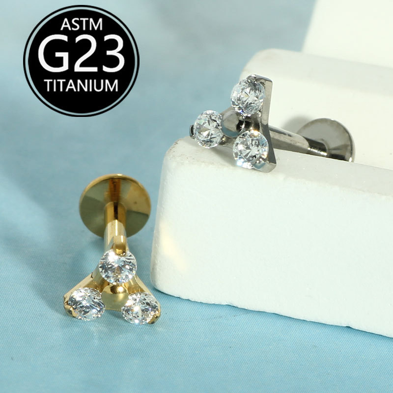 Silver pointed spike labret stud material detail