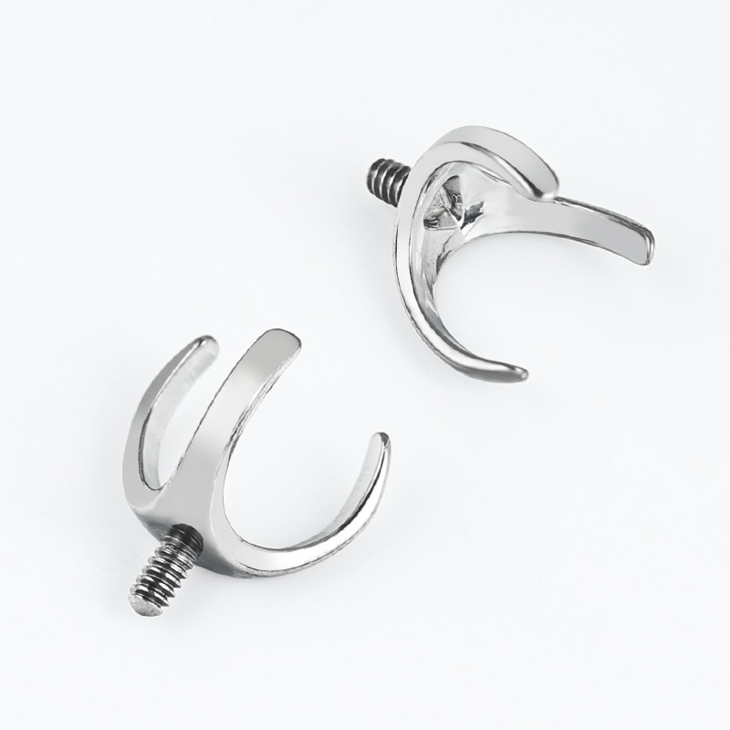 Silver pointed spike labret stud material detail