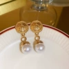 Golden earrings pearl