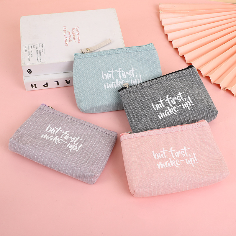 [Ventas directas de fábrica] diario simple carta bolsa de cosméticos portátil auricular bolsa de almacenamiento de monedas bolsa de viaje del estudiante
