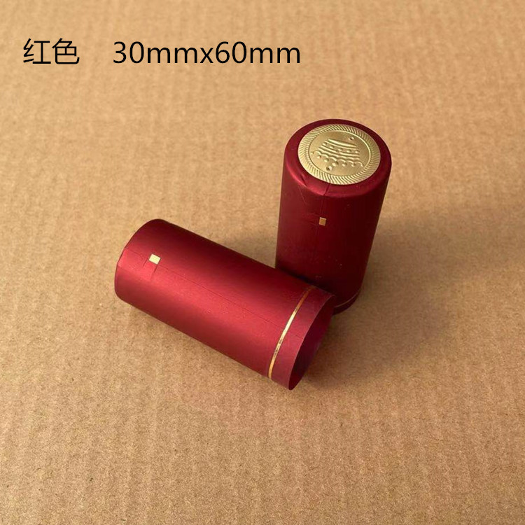 PVC tapa de plástico botella de vino rojo película de sellado cable de tracción fácil película Termocontraíble botella de vino de vidrio película de encogimiento en stock al por mayor