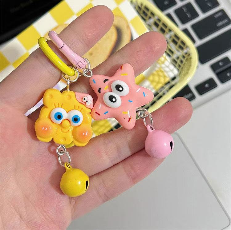Bob Esponja Pi Estrella pareja encantadora campana de dibujos animados colgante niña accesorios bolsas escolares estudiantes amigos