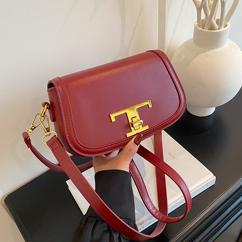 A principios de otoño 2025 nuevo bolso de mujer nicho bolso de diseño original bolso de brazo de moda moda moda bolsa de silla versátil bolso de tramo inclinado