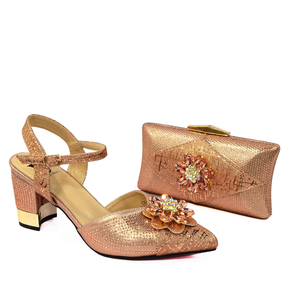 New golden backspace women's mid-heel bu...