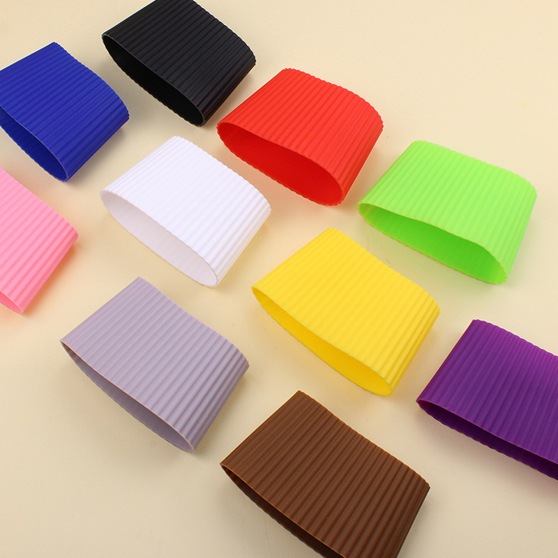 Place a wide 7.5 cm at the top and narrow 6.3 cm at the bottom stainless steel cup sleeve on the conical coffee cup, beautiful glass cup protector