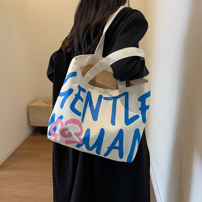 Commuting single-shoulder letter large-capacity versatile bag, canvas bag, Japanese student class artistic bag, women's tote handbag undefined