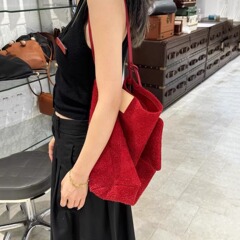 赤い雪のベルベットのフロスト牛革バケツバッグ女性レジャー2025新シングルバッグ大容量バッグ