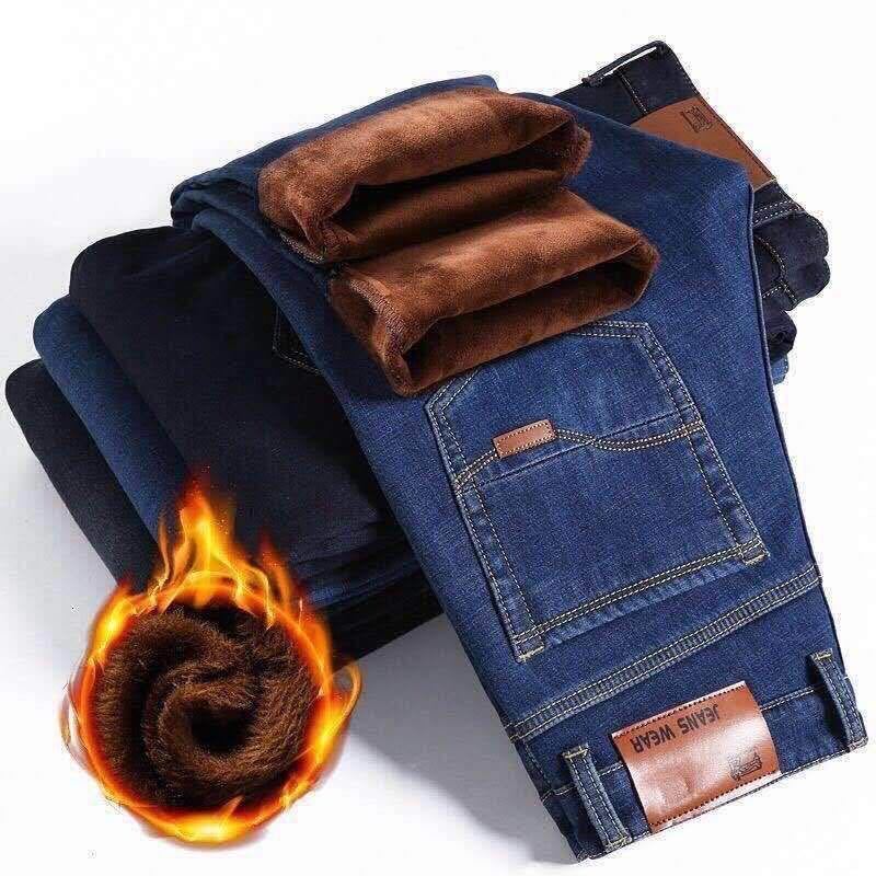 Otoño e invierno hombres más jeans gruesos de terciopelo hombres al por mayor pantalones de pierna recta sueltos de todo fósforo casuales pantalones de algodón cálidos y resistentes al desgaste hombres