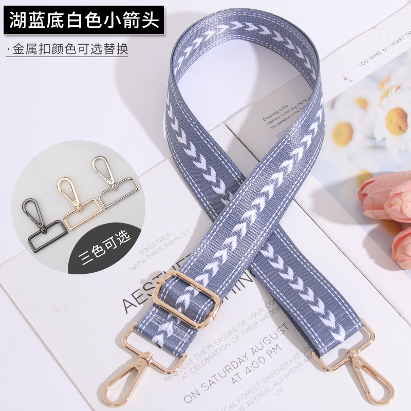 Small white arrow on lake blue background