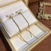 27# golden pearl tassel