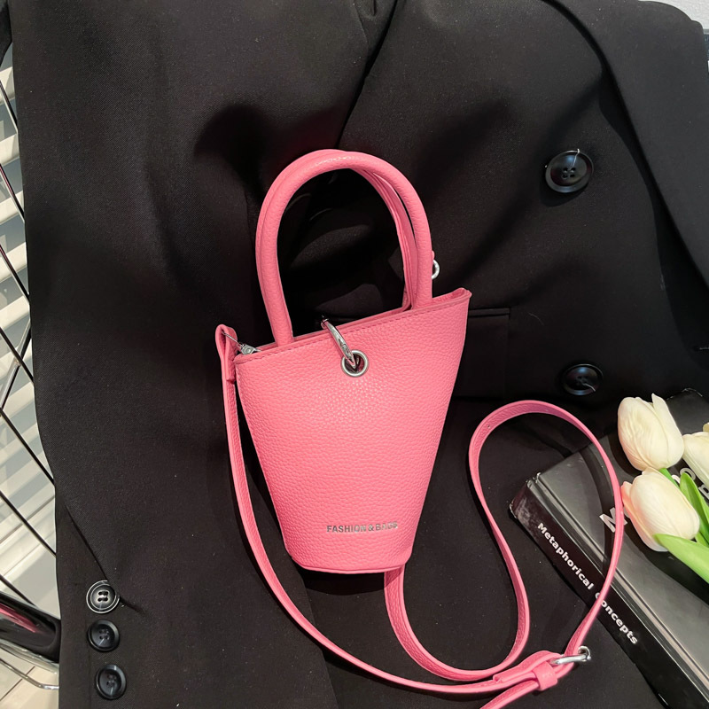 Bolso de cubo de diseño de nicho 2025 verano nuevo bolso de hombro con patrón de lichi mini bolso de mensajero de letras mujer