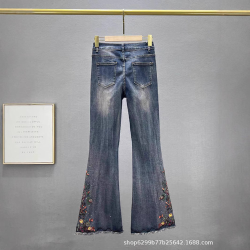Embroidered denim flared pants for women, 2024 winter new arrival—high-waisted, slim-fit, figure-flattering, ethnic-style, intricately crafted, fleece-lined long pants.