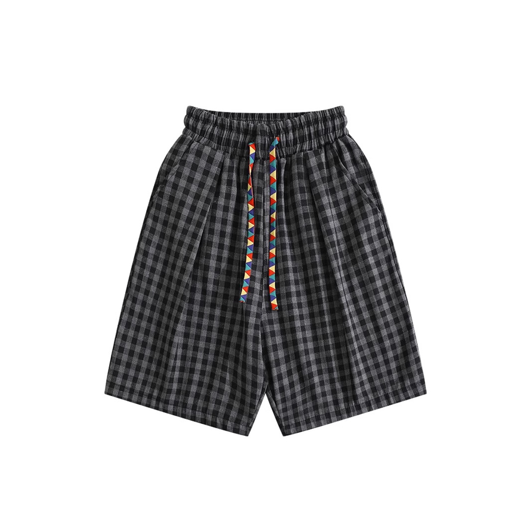 Retro pantalones cortos a cuadros negros y blancos para hombres y mujeres verano 2025 delgados de tirada deportivos casuales cinco pantalones delgados de piernas anchas