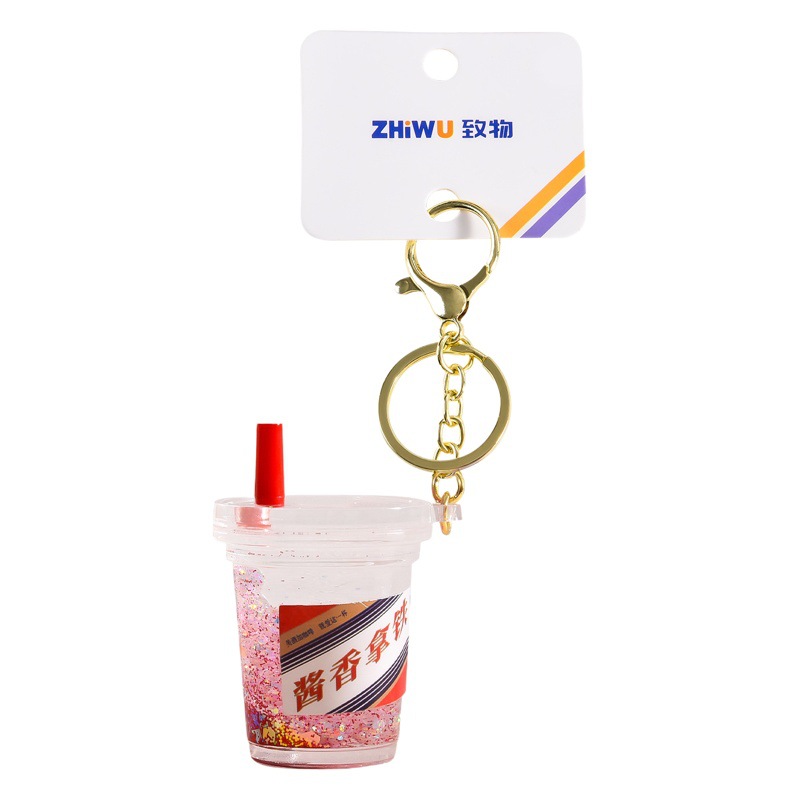 Nuevo aceite de arenas movedizas llavero lindo deriva botella de arenas movedizas colgante coche de dibujos animados llavero pequeño regalo al por mayor