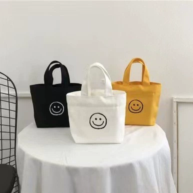 Милая улыбающаяся женская новая маленькая сумка-портфель, холщовая сумка для девочек, книга для закусок, ланч-бокс, маленькая сумка, сумка