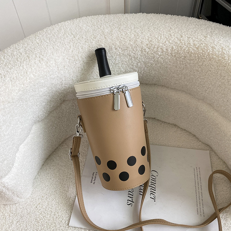 Piima-teekruusi isikupärastatud naiste ühe õlaga õlakott, trendikas uus 2024. aasta plahvatusohtlik Korea magevee ämbrikott_voghion.com