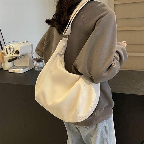 Canvas bag women's bag 2024 new solid color Ruiying fashion large capacity dumpling bag single shoulder crossbody commuter women's bag