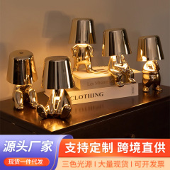 国境を越えた現物メッキ小金人電気スタンド思考者のアイデアが寝室のベッドの頭を飾って充電するナイトライト