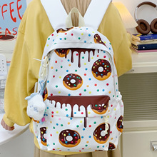 跨境新款三件套双肩包卡通印花可爱中小学生书包大容量手提便当包