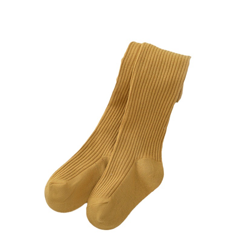 Nuevo color sólido rayas verticales polainas de las muchachas del otoño y el invierno estilo coreano ocasional los niños ropa exterior pantimedias blancas en stock