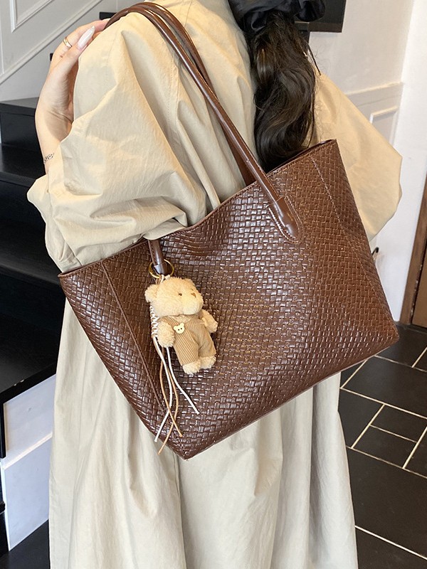 Bolsa de moda retro de gran capacidad para mujeres 2025 nueva bolsa de hombro transfronteriza simple textura casual bolso de abrigo