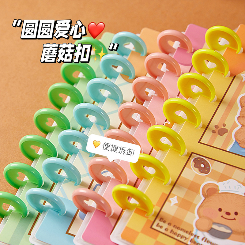 Nuevo libro de tarjetas de botón de hongos de cuatro cuartos de oso de gran capacidad de gran valor de la cara de la tarjeta de almacenamiento de la pequeña tarjeta de frijoles