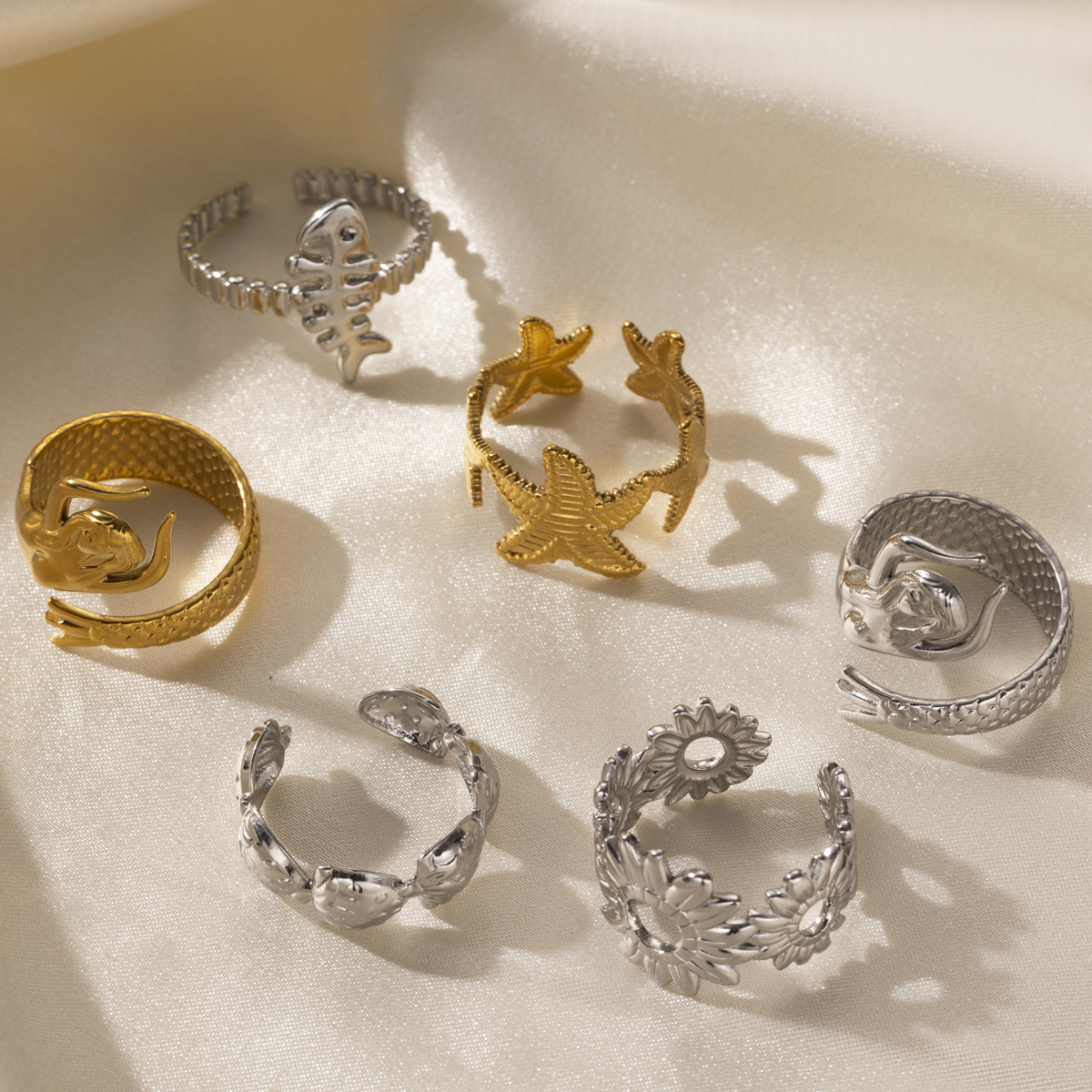 Anillo de acero inoxidable europeo y americano de Tena, lujo ligero, sensación de alta calidad, oro y plata, playa marina de dos colores, anillo de acero de titanio galvanizado, joyas de mano