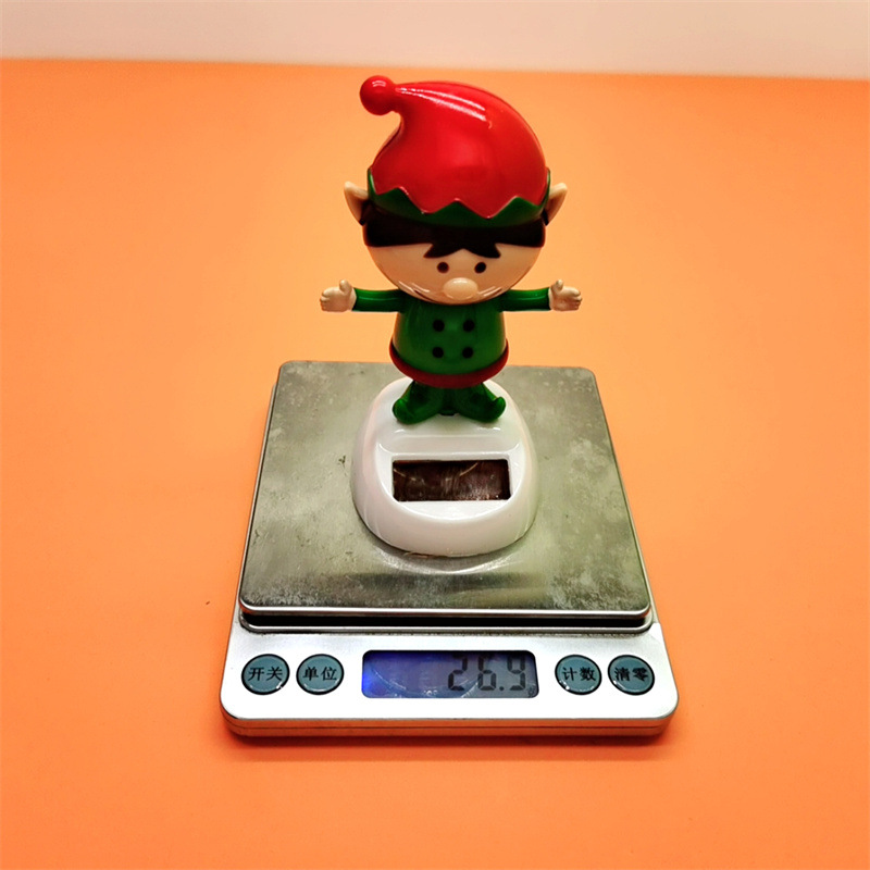 Cross-border Christmas solar energy automatic swing doll car interior shake head decorations creative car car ornaments