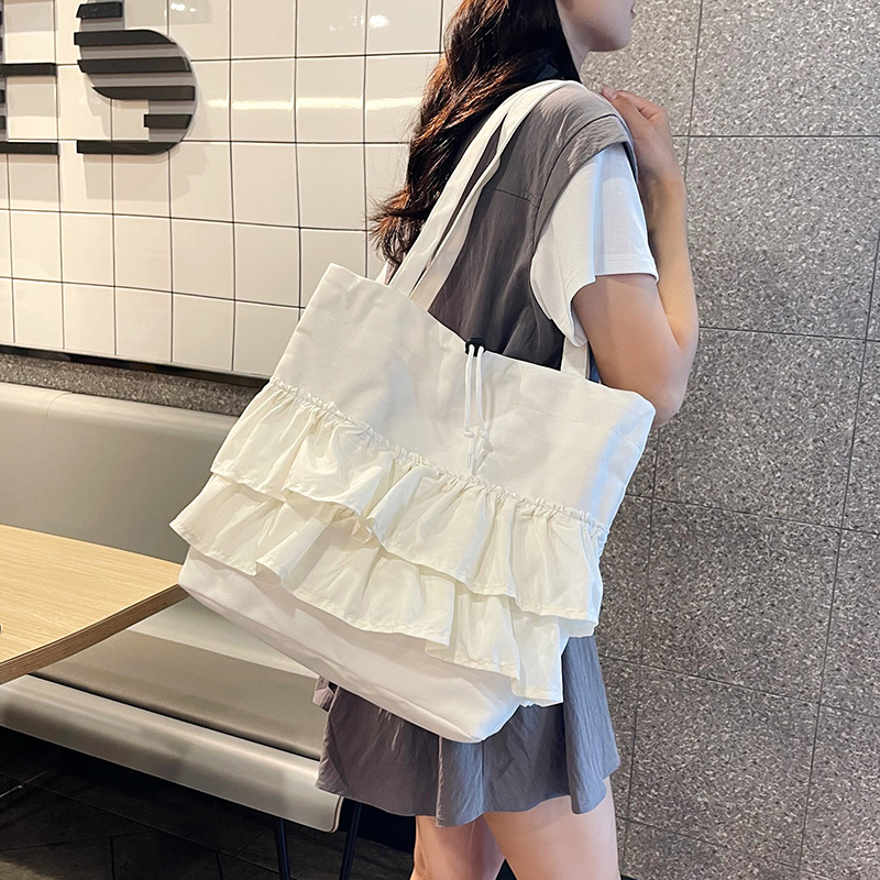 Capacious shoulder bag