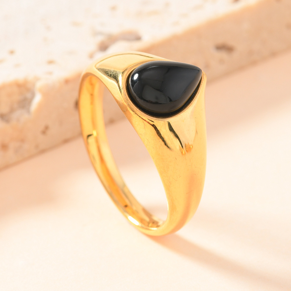 Anillo de acero de titanio de moda europea y americana mujer no se desvanece fundición de gota de agua anillo de piedra natural joyas de lujo al por mayor